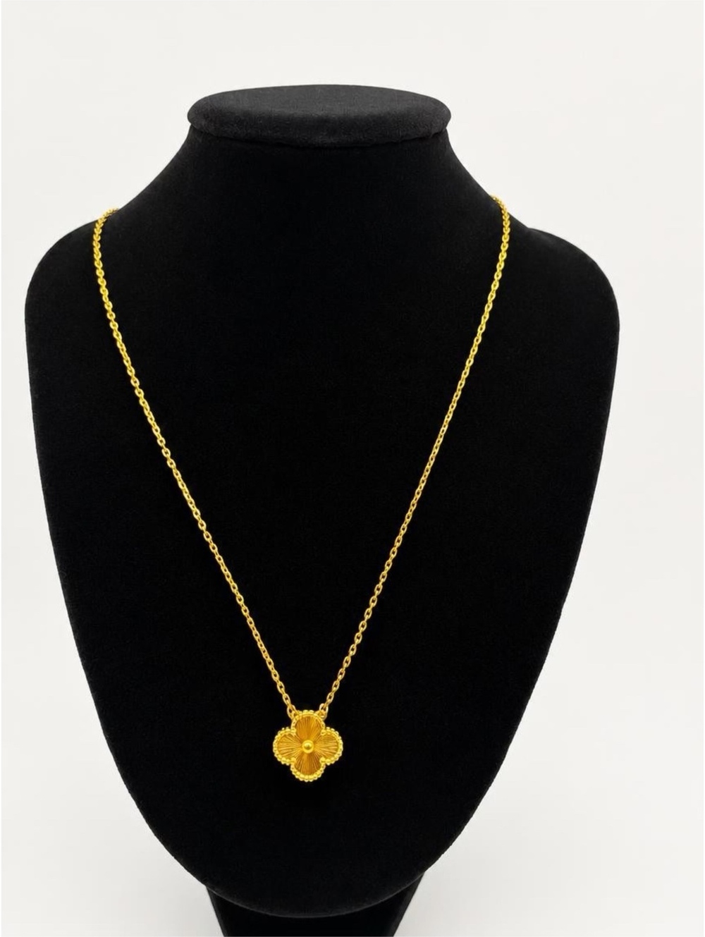 Elegant Gold-Tone Four-Leaf Pendant Necklace with Chain